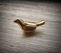 Small sleek gold bird drawer handle/Gold brass bird shaped cabinet pull/small chickadee door knob/nursery furniture hardware/Bird door knob