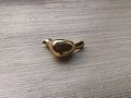 Small sleek gold bird drawer handle/Gold brass bird shaped cabinet pull/small chickadee door knob/nursery furniture hardware/Bird door knob