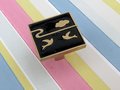 Brass and enamel drawer handle/Black and gold cabinet pull/Bird door knob/nursery furniture hardware/Unusual door handle/Dresser door knob