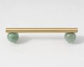 Silky matte gold brass bar handle resting on semi precious stone balls/colourful cabinet handle/stone furniture hardware/crystal drawer pull