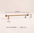 Bronze bar handle resting on tiger eye stone ball/Bronze and tiger eye cabinet handle/Semi precious stone and aged brass furniture hardware