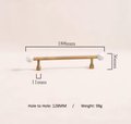 Bronze bar handle resting on white marbl ball/Bronze and marble stone cabinet handle/Semi precious stone and aged brass furniture hardware