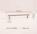 Bronze bar handle resting on white marbl ball/Bronze and marble stone cabinet handle/Semi precious stone and aged brass furniture hardware