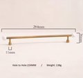 Bronze bar handle resting on white marbl ball/Bronze and marble stone cabinet handle/Semi precious stone and aged brass furniture hardware