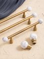 Bronze bar handle resting on white marbl ball/Bronze and marble stone cabinet handle/Semi precious stone and aged brass furniture hardware