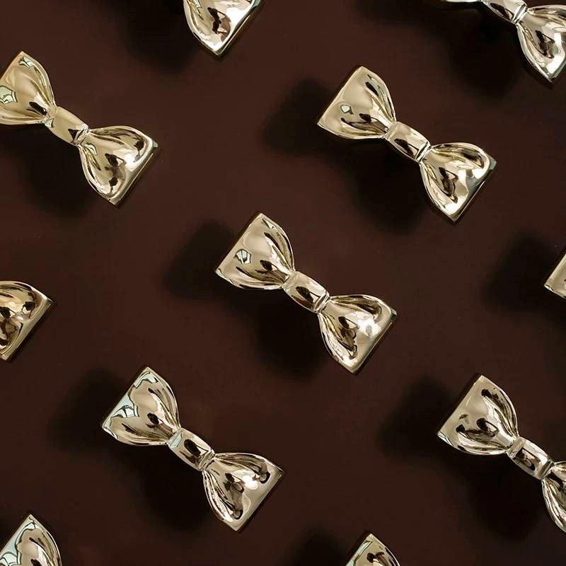 Cute shiny Gold or Silver bow shaped cabinet pull/Ribbon bow drawer handle/Gold or Silver furniture hardware/Ribbon bow nursery door knob