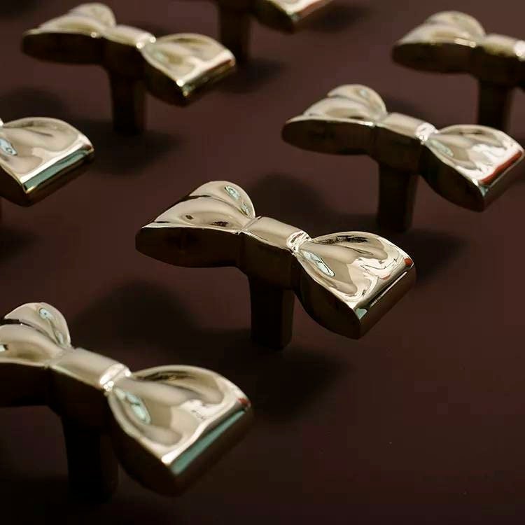 Cute shiny Gold or Silver bow shaped cabinet pull/Ribbon bow drawer handle/Gold or Silver furniture hardware/Ribbon bow nursery door knob