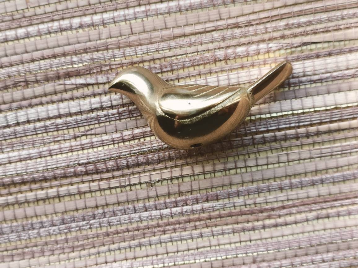 Small sleek gold bird drawer handle/Gold brass bird shaped cabinet pull/small chickadee door knob/nursery furniture hardware/Bird door knob