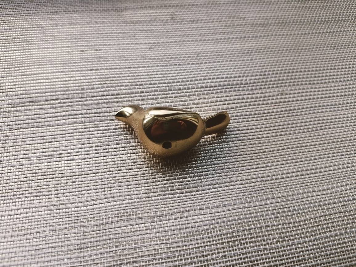 Small sleek gold bird drawer handle/Gold brass bird shaped cabinet pull/small chickadee door knob/nursery furniture hardware/Bird door knob