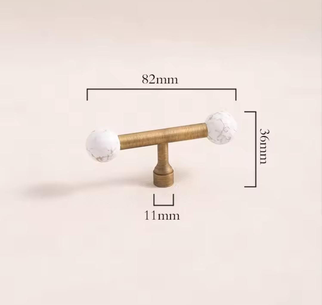 Bronze bar handle resting on white marbl ball/Bronze and marble stone cabinet handle/Semi precious stone and aged brass furniture hardware
