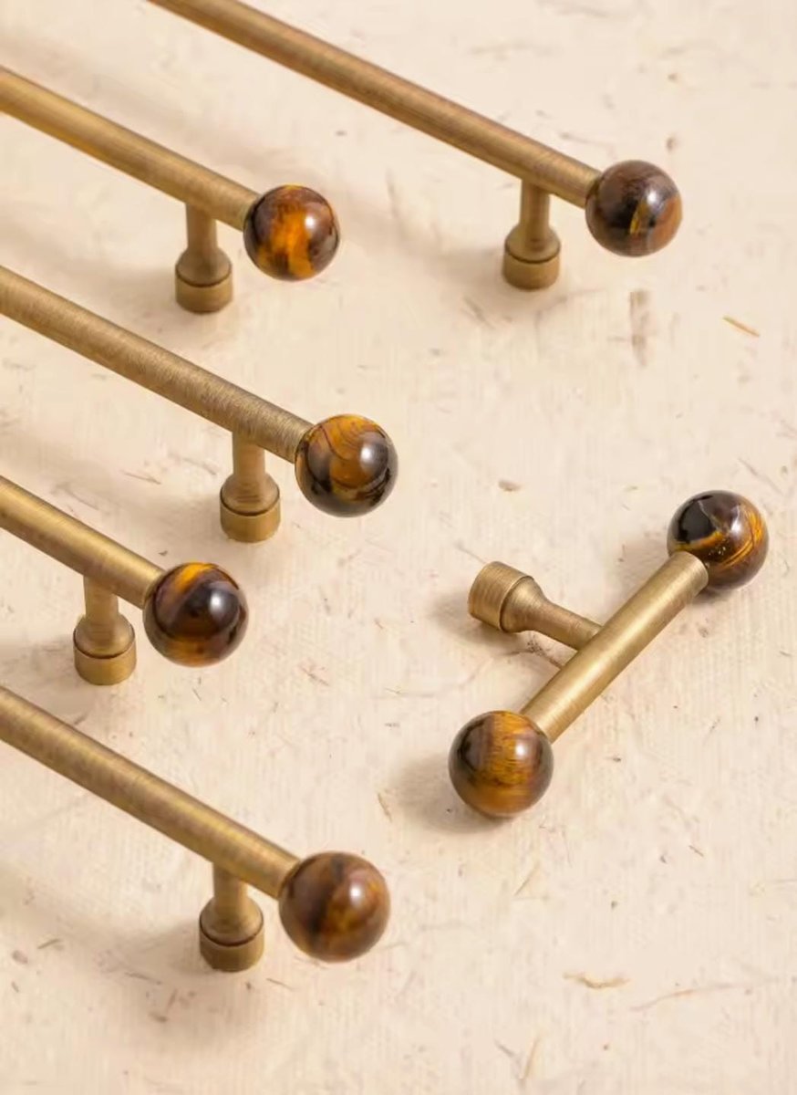 Bronze bar handle resting on tiger eye stone ball/Bronze and tiger eye cabinet handle/Semi precious stone and aged brass furniture hardware