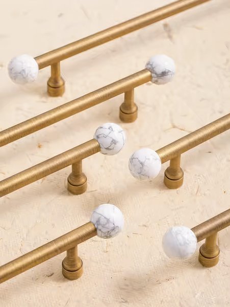 Bronze bar handle resting on white marbl ball/Bronze and marble stone cabinet handle/Semi precious stone and aged brass furniture hardware